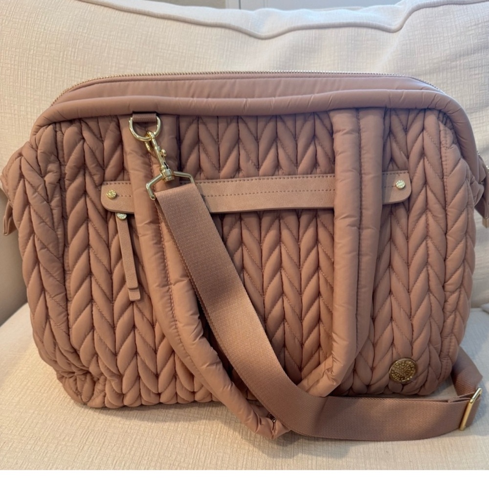 Pre owned Happ Brand Paige Caryall Diaper bag slight stain I can see in pic